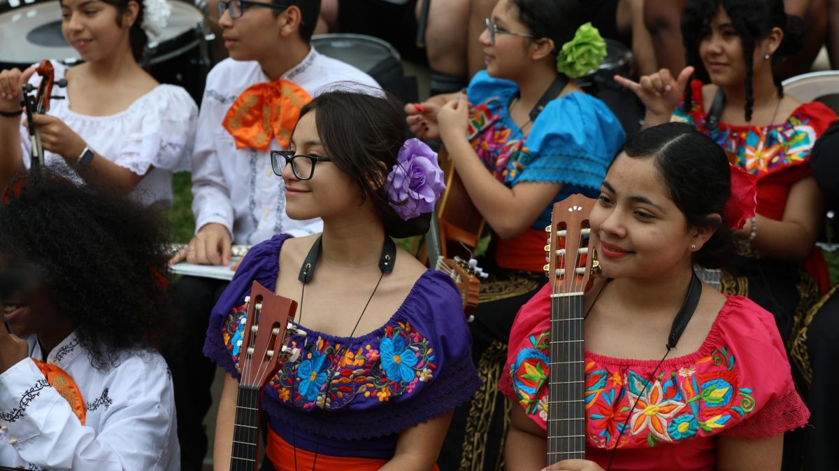 Members of a children's Mariachi band listen to speakers after performing during the Save Texas Schools Rally at the Texas Capitol Saturday. Justin Doud/TSTV News