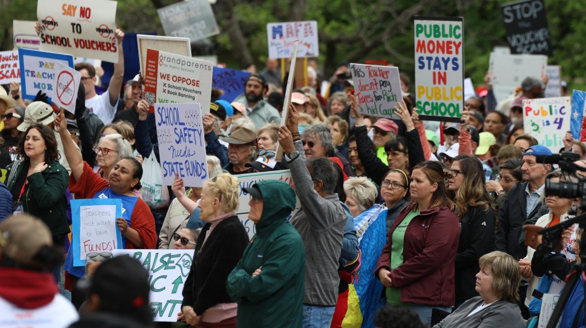 Protesters hold up signs relating to education policy during the Save Texas Schools Rally at the Texas Capitol Saturday. Justin Doud/TSTV News