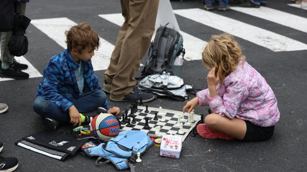 Two children play chess during the Save Texas Schools Rally at the Texas Capitol Saturday. Justin Doud/TSTV News