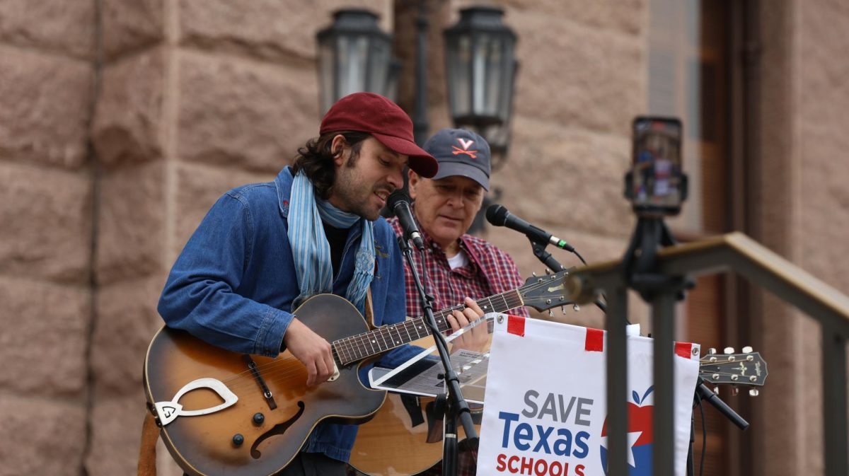 A musician performs a rendition of 867-5309/Jenny with anti-voucher lyrics during the Save Texas Schools Rally at the Texas Capitol Saturday. Justin Doud/TSTV News