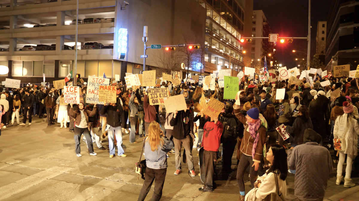 Protestors block a downtown intersection at 7th Street during a demonstration Friday.